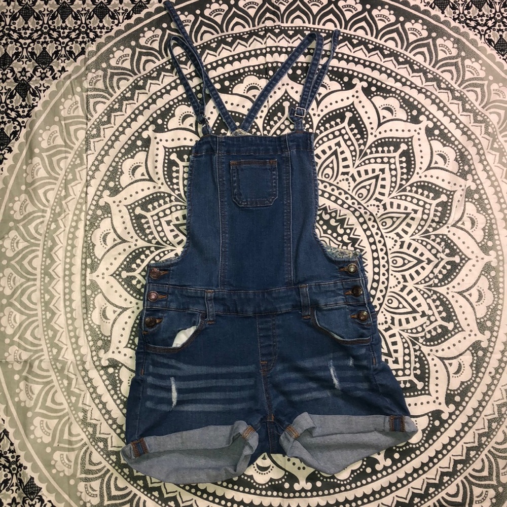 Denim overalls.